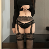 Black lace garter belt and stocking detail