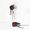 Leather cuff with brocade accent and chain leash
