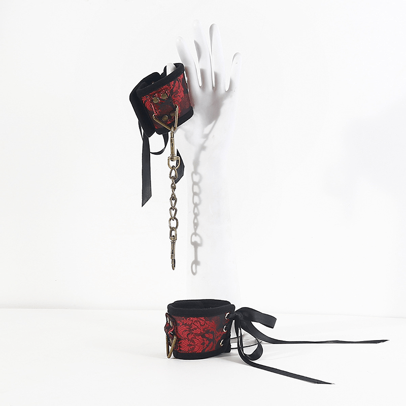 Leather cuff with brocade accent and chain leash