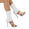 White stretch sock boot heels worn in side profile