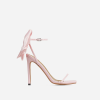 Single pink oversized bow sandal in side profile