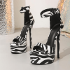 Zebra ankle strap platform heels in front product view